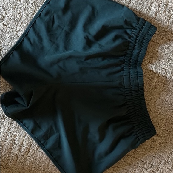 Vuori Women's DARK GREEN Clementine 2.0 shorts, 2.5” - Picture 2 of 6